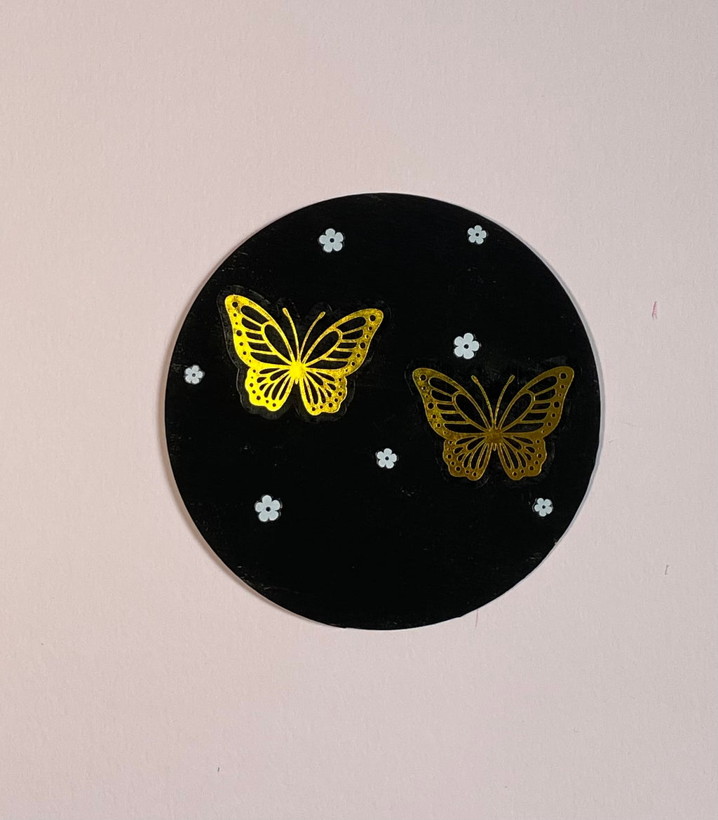 Golden butterfly coaster
