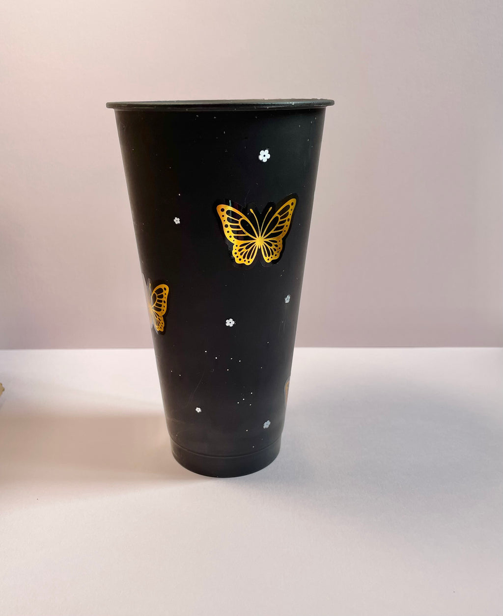Black with Gold butterflies tumbler ( 700ml comes with lid and straw)